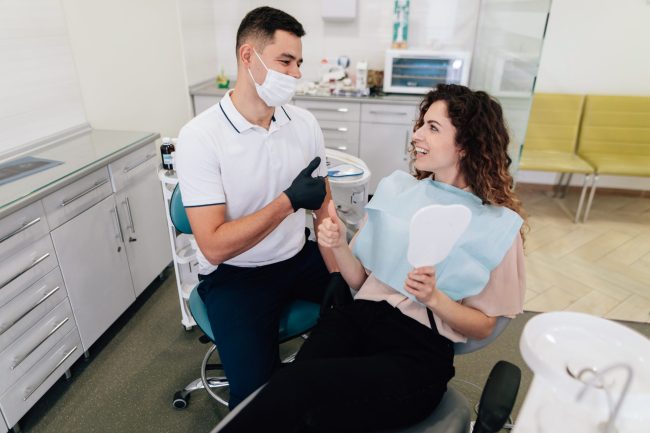 dentist-patient-happy-smiley dental implants